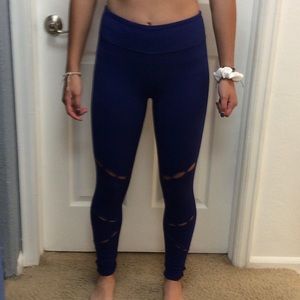 Blue fabletics leggings with unique cuts